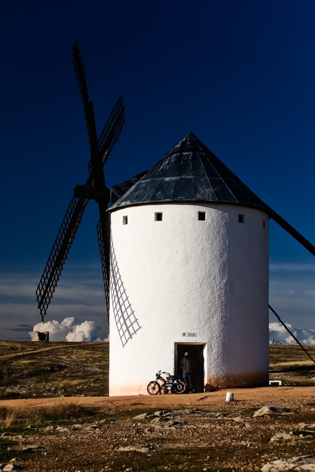 Modern Sancho A windmill and a motorbiki in Campo de Criptana