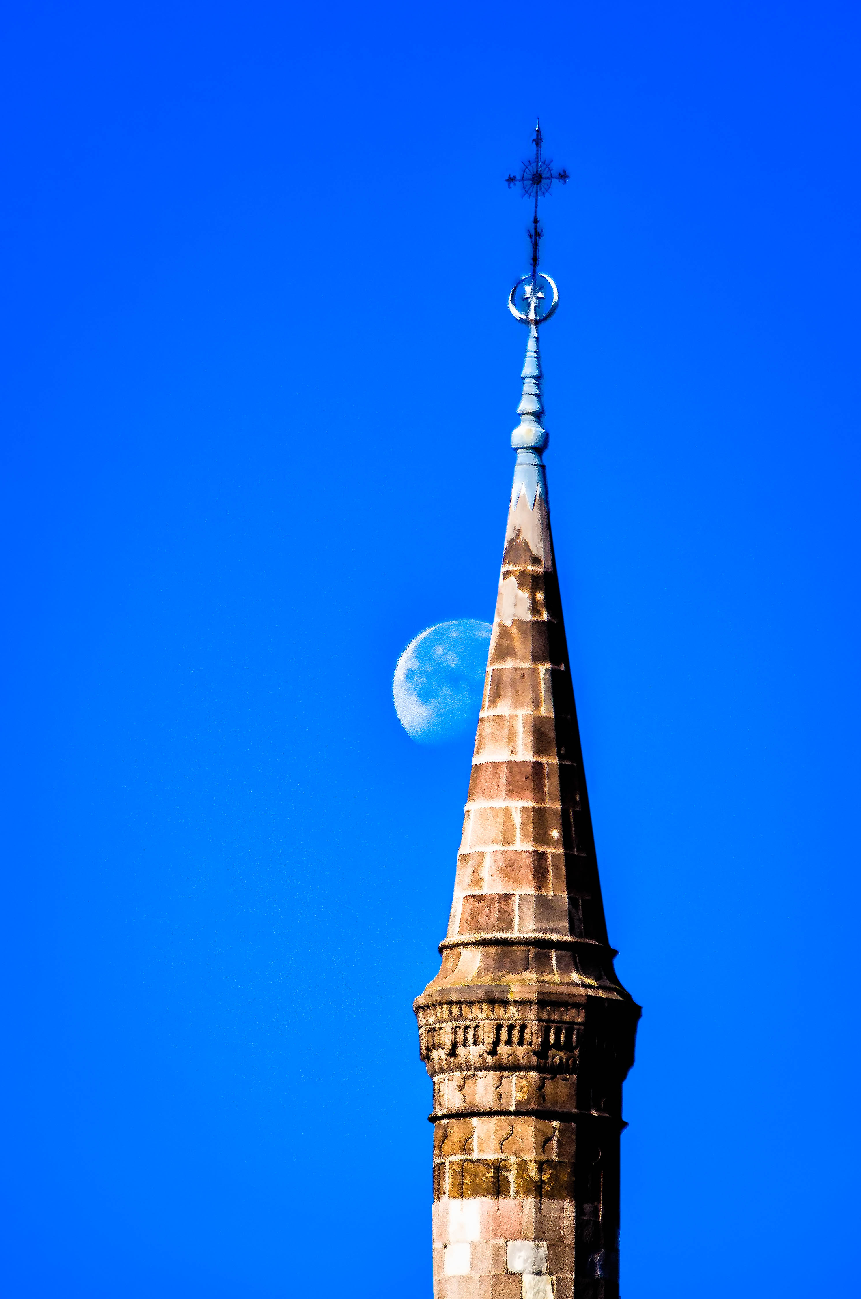 Eger minaret and rising moon